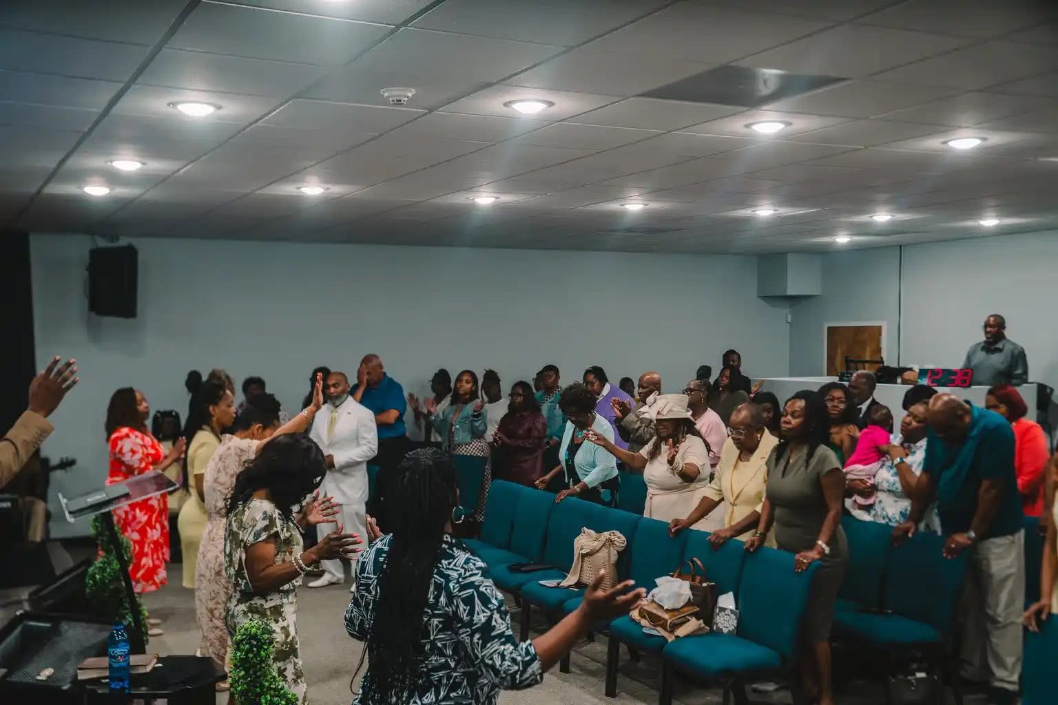 Full sanctuary standing in worship