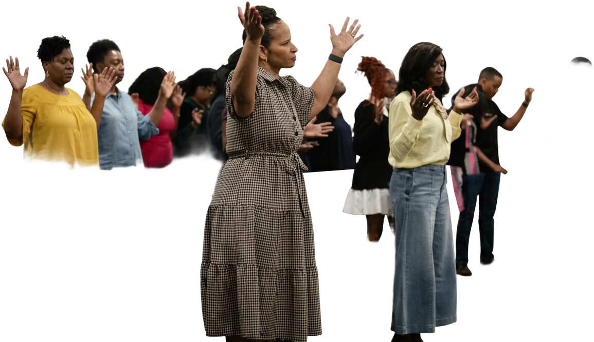 Purposed Movement Church congregation worshipping with raised hands
