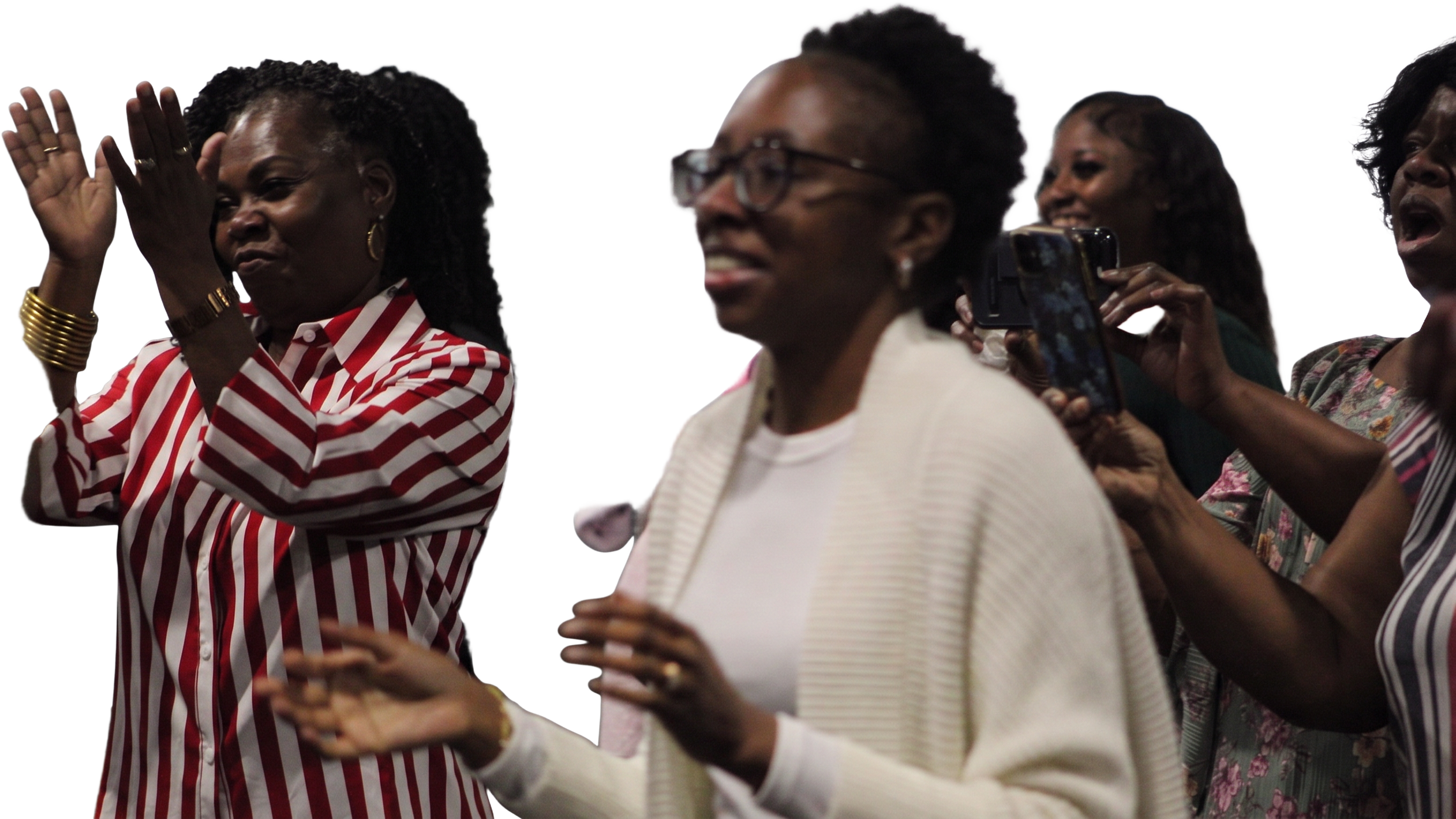 Members of the congregation clapping in praise