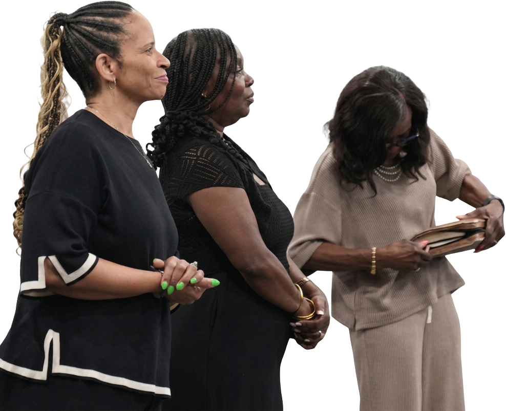 Women of the church standing together in worship